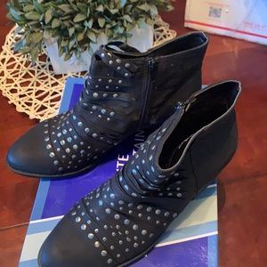 Black boots with silver accents